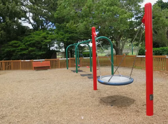 Amazing playground with everything a kid could want, plus gorgeous views of green hills.