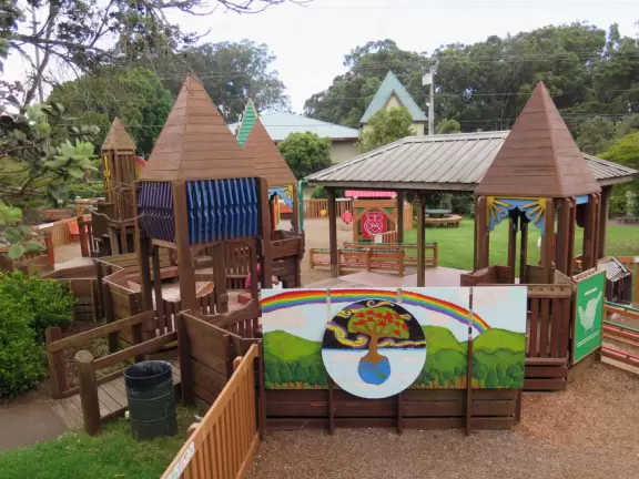 Amazing playground with everything a kid could want, plus gorgeous views of green hills.
