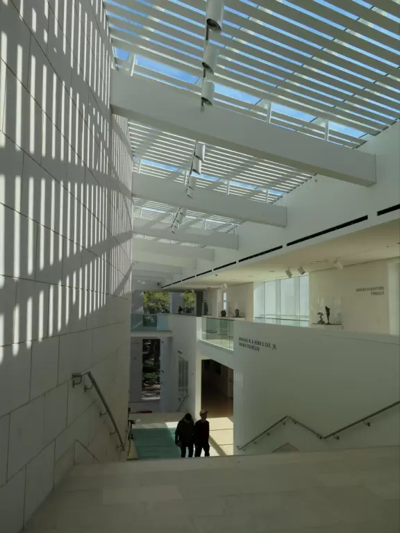 Incredible glass building with interesting activity stations for kids and modern art for parents.