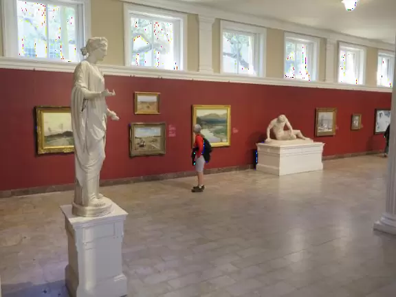 Incredible glass building with interesting activity stations for kids and modern art for parents.