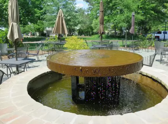 Cute neighborhood with shady streets, wonderful bookstore, coffee shop with great outdoor seating, and belted goats to check out.