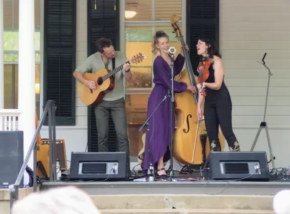 Walk past the beautiful sorority and fraternity houses in the shade of trees.