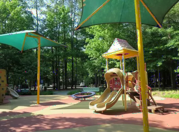 Pretty park in the forest, with good play equipment.