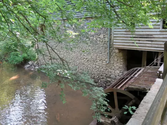 Cute spot on the river with historic mill, tobacco packhouse, and farmhouse, plus a dam.