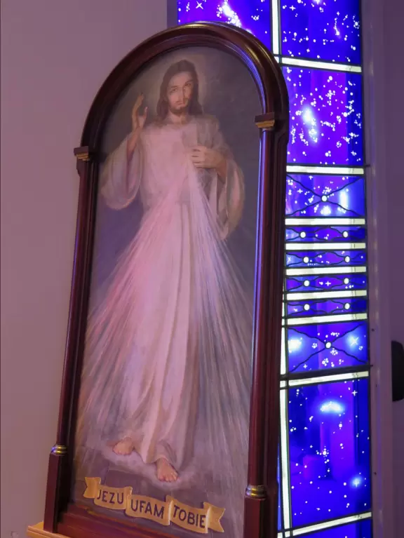 Beautiful modern basilica with gift shop, water lilies, stained glass, rose window, organ and exceptional choir.