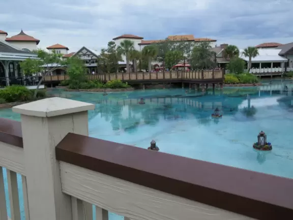 Waterfront area with restaurants, live street performers, entertainment, toy stores, and carousel.