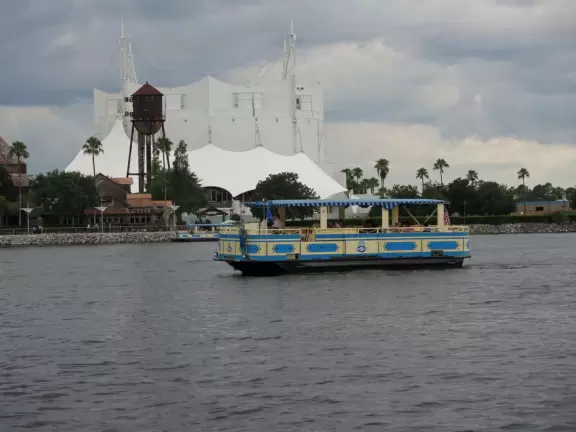 Waterfront area with restaurants, live street performers, entertainment, toy stores, and carousel.