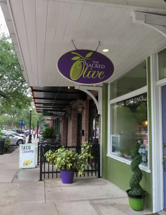 A cute main strip with restaurants, a bike path, and a splash pad.