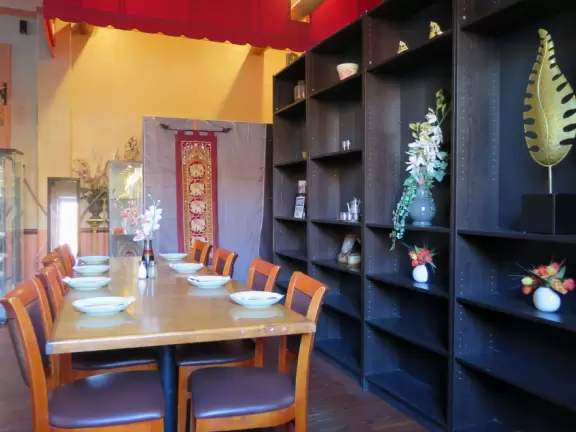 A cute main strip with restaurants, a bike path, and a splash pad.