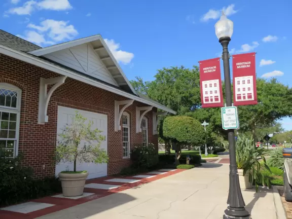 A cute main strip with restaurants, a bike path, and a splash pad.