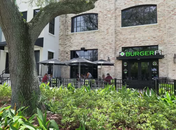 A cute main strip with restaurants, a bike path, and a splash pad.