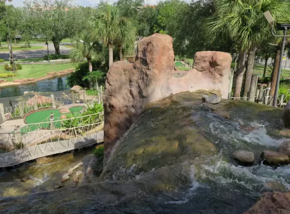 Beautiful mini golf with waterfalls, caves, pirate ship, tropical landscaping, and lots of shade.