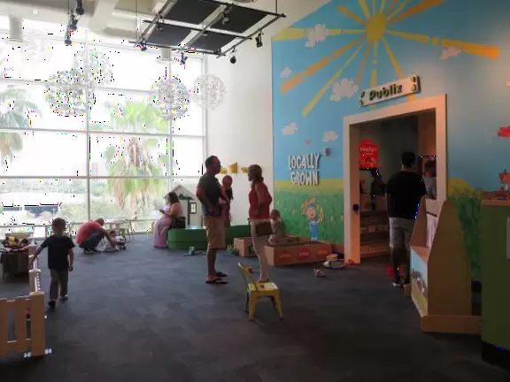Super children's museum with rope climbey, music station, dance area, lincoln logs, magnetic triangles, sand that responds, supermarket, and more!