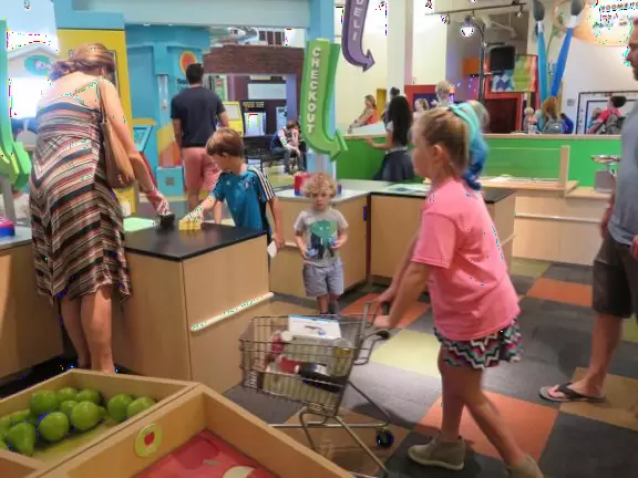 Super children's museum with rope climbey, music station, dance area, lincoln logs, magnetic triangles, sand that responds, supermarket, and more!