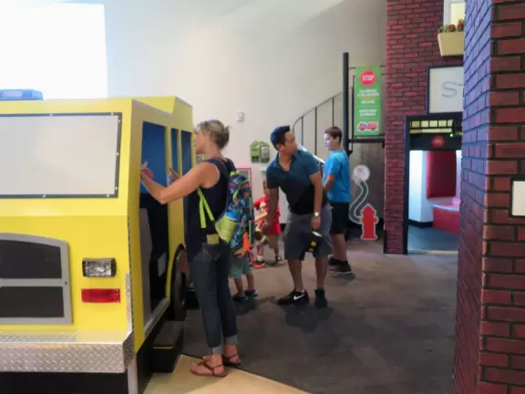 Super children's museum with rope climbey, music station, dance area, lincoln logs, magnetic triangles, sand that responds, supermarket, and more!