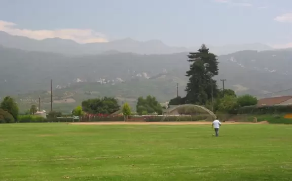 Gorgeous mountain panorama, playground with four large slides, swings, grassy knolls, and plenty of shade.
