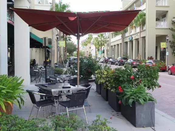 2.5 mile walk around the lake, plus cute sidewalk cafes under palm trees with ferns.