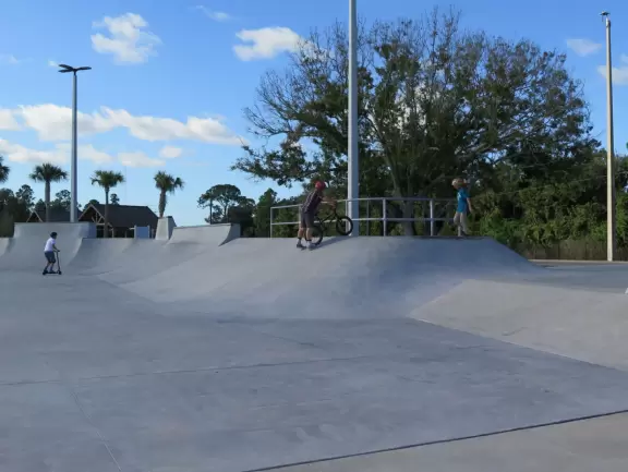 Large, creative playground with many fun things to do, splash pad, and skate park.