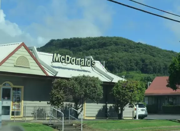 Waimea town has misty green hills, two adorable churches, a wooden playground with gorgeous views, and lovely countryside drives.