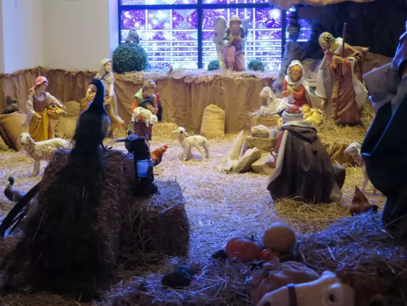 Beautiful modern basilica with gift shop, water lilies, stained glass, rose window, organ and exceptional choir.