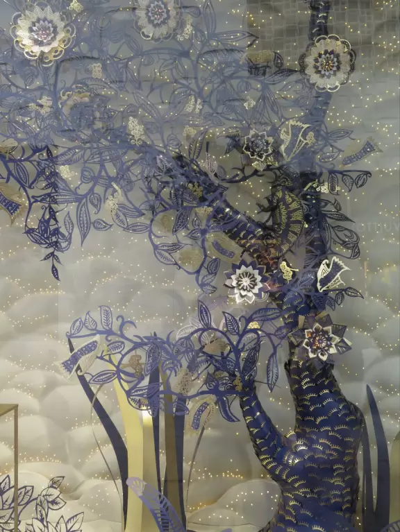 Beautiful architecture, sculptures, modern art museum, designer stores, play equipment, and public market with swings.