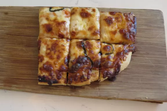 Beautiful architecture, sculptures, modern art museum, designer stores, play equipment, and public market with swings.