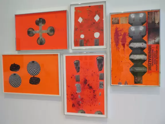 Beautiful architecture, sculptures, modern art museum, designer stores, play equipment, and public market with swings.