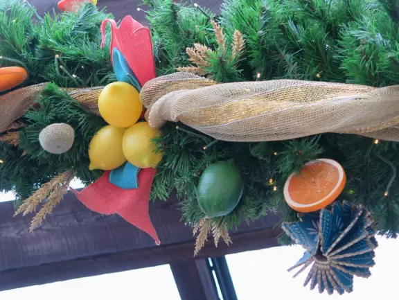 Waterfront area with restaurants, live street performers, entertainment, toy stores, and carousel.