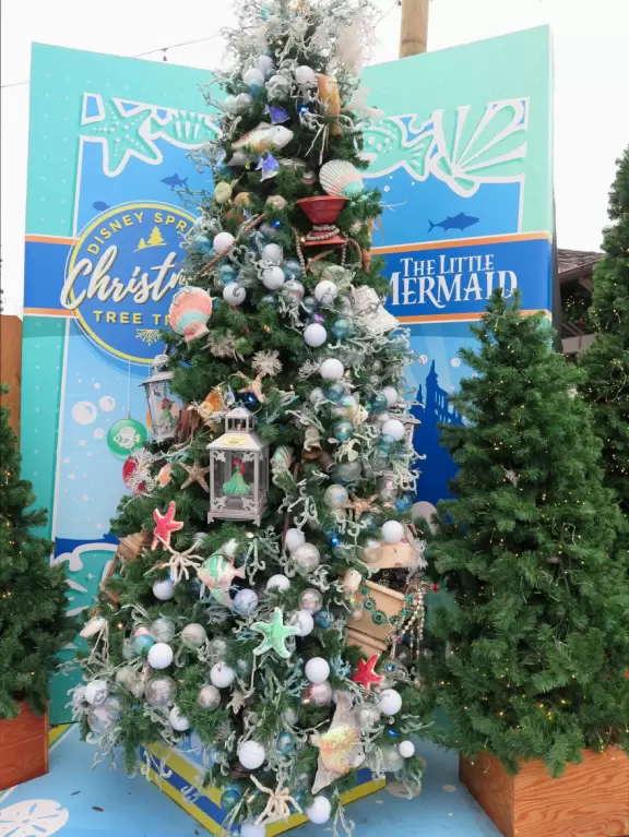 Waterfront area with restaurants, live street performers, entertainment, toy stores, and carousel.