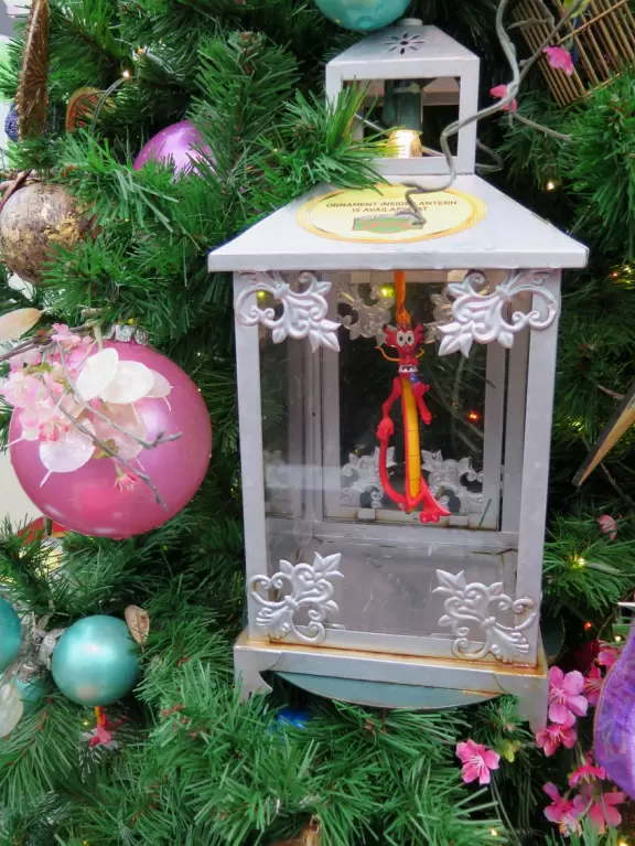 Waterfront area with restaurants, live street performers, entertainment, toy stores, and carousel.