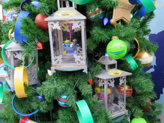 Waterfront area with restaurants, live street performers, entertainment, toy stores, and carousel.