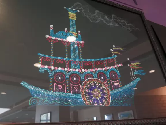 Modern building with large windows, fascinating Peruvian and Costa Rican objects, and sculpture garden in Loch Haven Park.