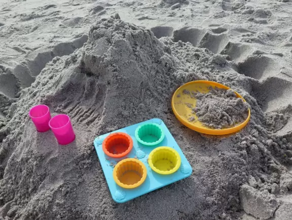 Hard sand good for sand castles. Good location to see rocket launch.