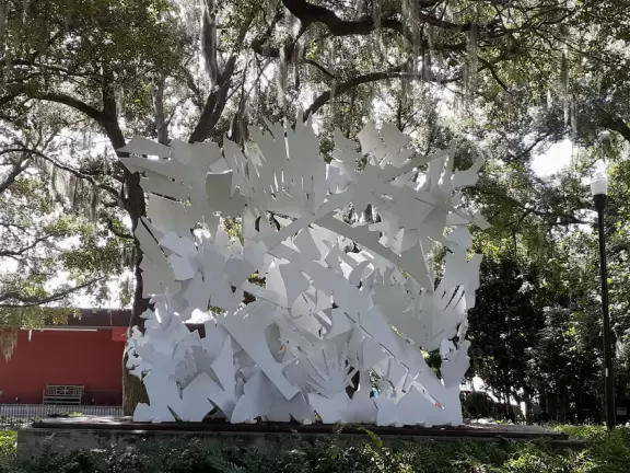 Modern building with large windows, fascinating Peruvian and Costa Rican objects, and sculpture garden in Loch Haven Park.