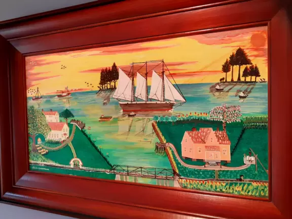 Modern building with large windows, fascinating Peruvian and Costa Rican objects, and sculpture garden in Loch Haven Park.