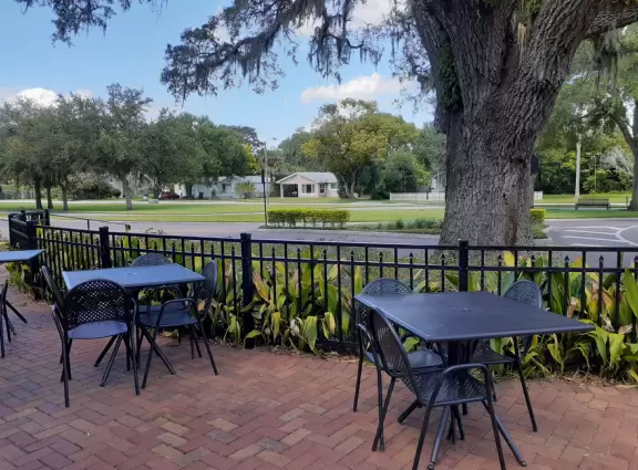 A cute main strip with restaurants, a bike path, and a splash pad.