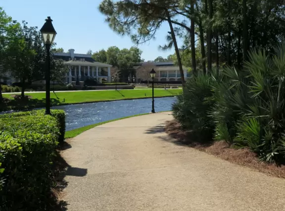 Two resorts that look like New Orleans, plus the lovely walking path along the river that runs between them.
