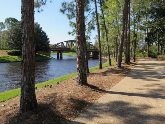 Two resorts that look like New Orleans, plus the lovely walking path along the river that runs between them.