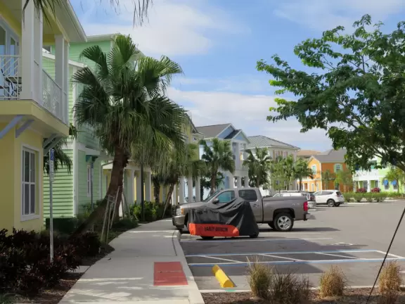 Ultra colorful resort with palm trees galore, live music by the pool, hotel rooms plus cottages, and shopping center.