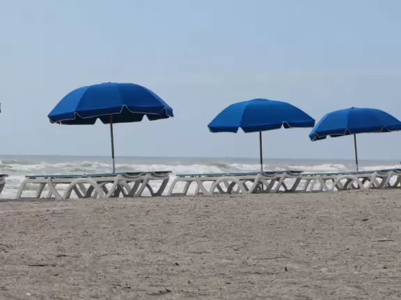Beach with pretty dunes, slightly grody shoreline, and great walk to jetty.
