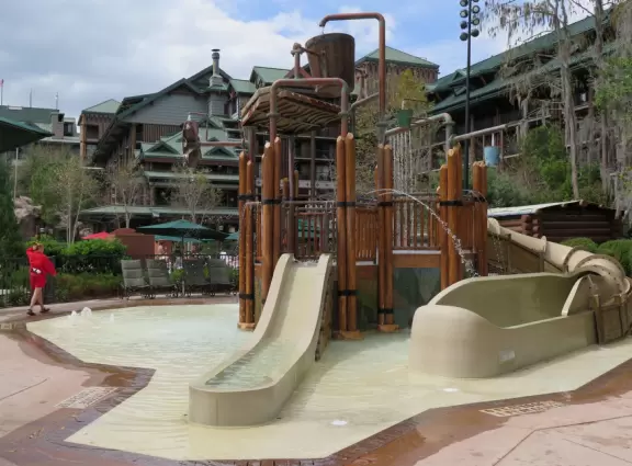 Walk the impressive lobby and forested grounds of the Wilderness Lodge, then catch the boat over to Contemporary Resort.