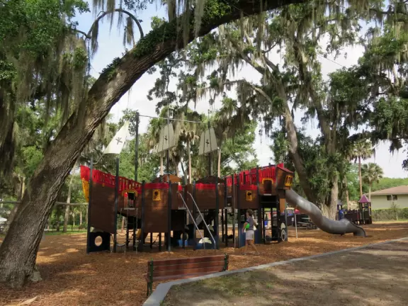 Imaginative ship playground, awesome rope climbing structure, stream, flowers, trees, and walk to lighthouse.