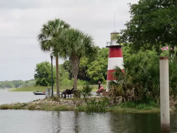 Lovely land jutting out on Lake Dora, with a lighthouse and walking paths.