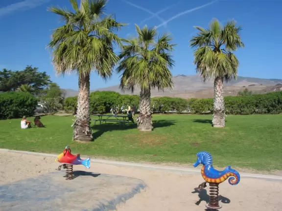 A wild, pretty beach with a great playground and snack shop.