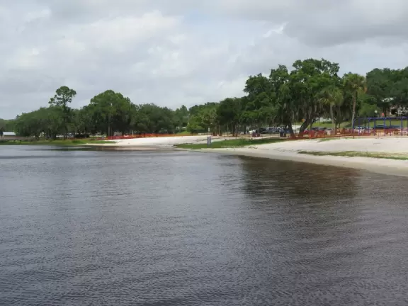 Fun spot on Lake Minneola, with white sand, palm trees, a bike path, a splash pad, and lots of water sports.
