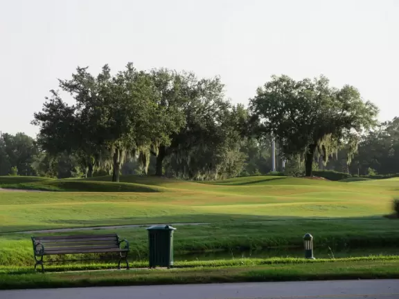 Pleasant walk along the golf course, past pretty houses with gardens, mansions, canals, ducks, bridges, and places to eat.