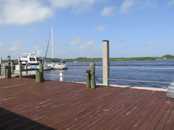 Small marina with docks on the inlet.