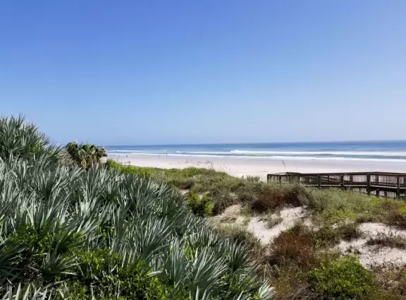 Nice beach with shallow, clear water.