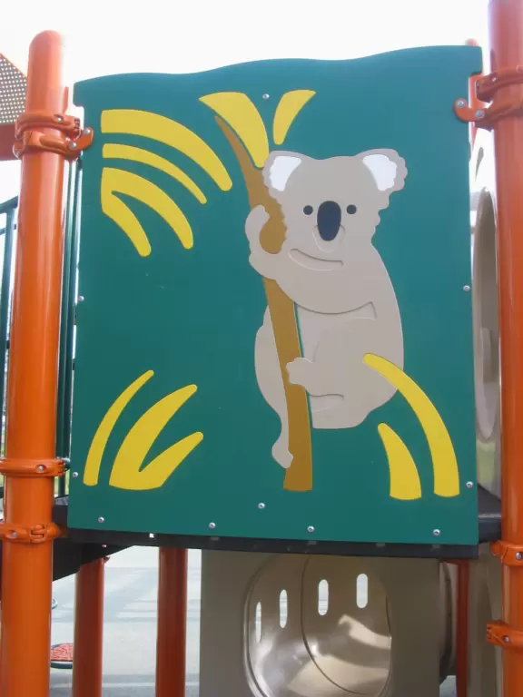 A wonderful neighborhood park with huge oak trees, winding paths, and a super fun new playground.