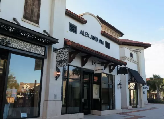 Waterfront area with restaurants, live street performers, entertainment, toy stores, and carousel.